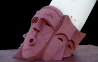 African Mask Tusk Holder in Clay